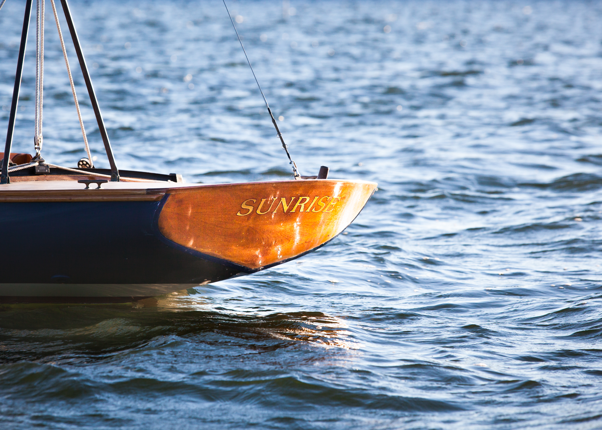 photograph by Bryan Hatchett, copyright, Bryan Hatchett, color photograph, sailboat, sunrise on Fishing Bay, Deltaville, Virginia.